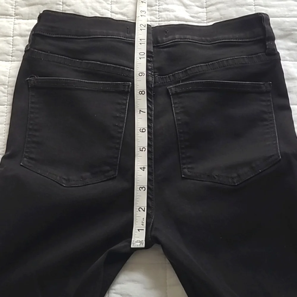 Free People high rise super skinny Plain black stretch jeans Size 27